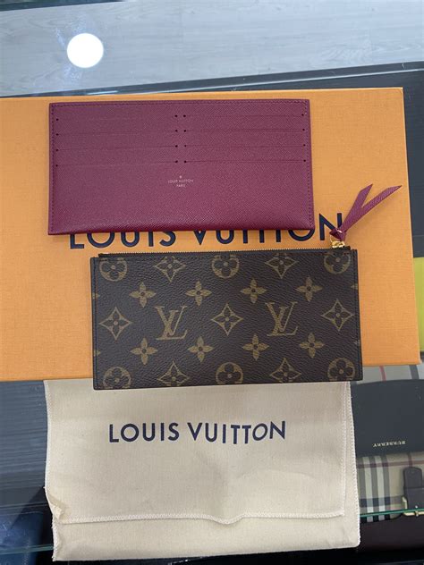 portafoglio gucci e louis vuitton